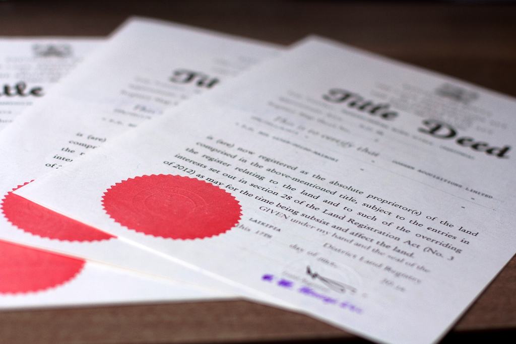 verify title deed Kenya, land ownership Kenya, safe land investment, property valuation Kenya, land for sale Nairobi